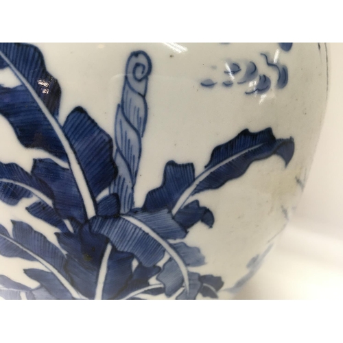 1165 - A Chinese Kangxi blue and white Baluster  vase  decorated with figures amongst a landscape  view .
S... 