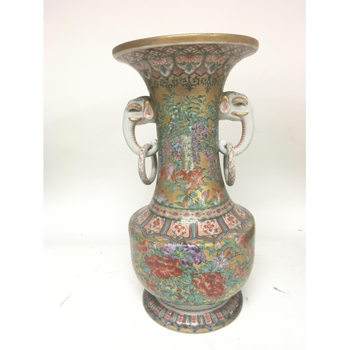 1185 - A Fine quality late 19th century Oriental vase with raised elephant and ring side handles. The sides... 