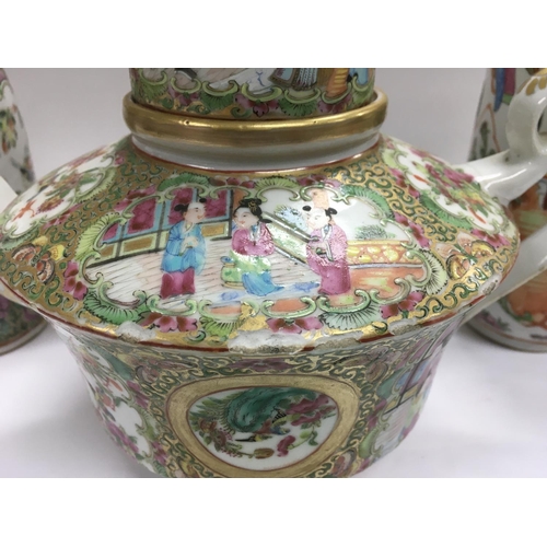 1191 - A Canton teapot and two Canton vases, approx height of tallest 26cm. Some damage, see images.