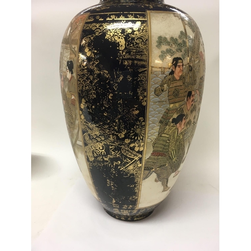 1210 - A Japanese satsuma vase decorated with figures with landscape view 32 cm