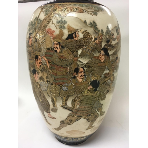 1210 - A Japanese satsuma vase decorated with figures with landscape view 32 cm