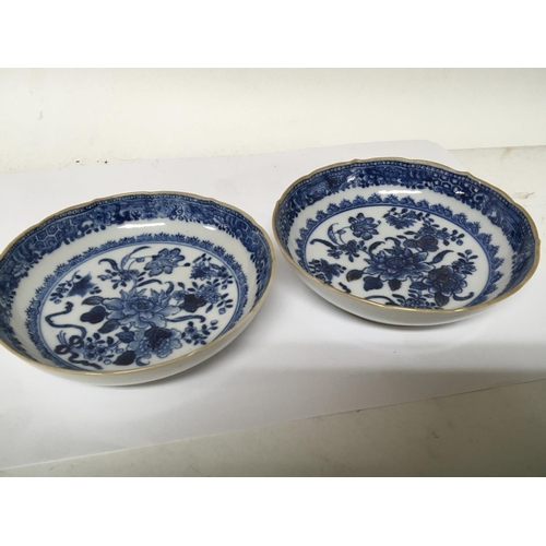 1212 - A pair of late 18th century Chinese Export porcelain blue and white dishes with shaped edges traces ... 