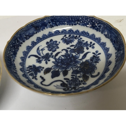 1212 - A pair of late 18th century Chinese Export porcelain blue and white dishes with shaped edges traces ... 