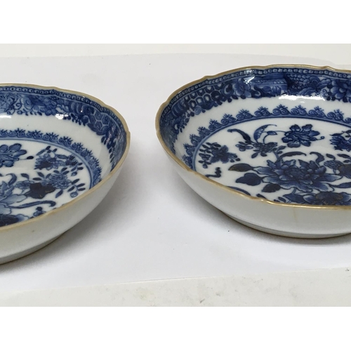 1212 - A pair of late 18th century Chinese Export porcelain blue and white dishes with shaped edges traces ... 