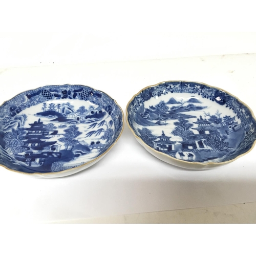 1213 - A pair of Chinese early 19th century Export porcelain blue and white dishes decorated with pagodas. ... 