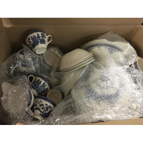 1216 - Seven boxes of mainly flow blue Victorian ceramics together with other china tea sets.