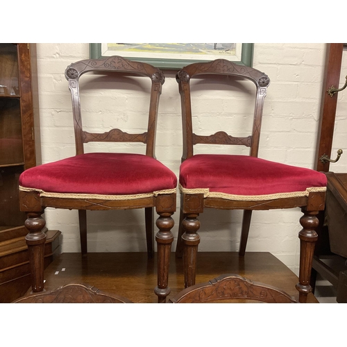 1262 - A set of six Victorian walnut dining chairs with upholstered seats on turned and Fluted legs. (6) NO... 