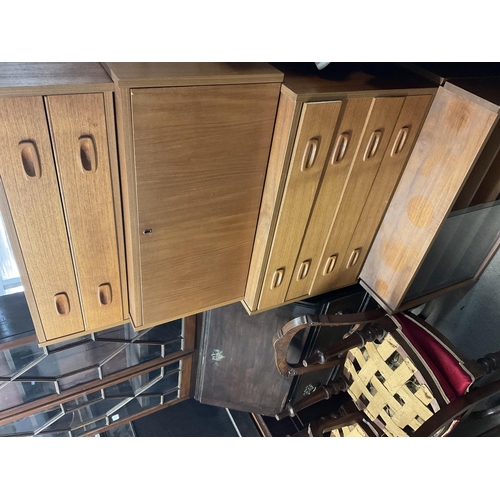 1264 - No Reserve: A suite of mid 20th century Danish teak floating hanging cupboards.