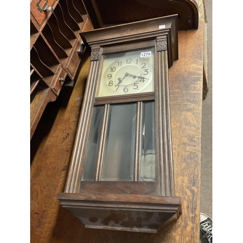 1267 - A 1930s oak wall clock NO RESERVE