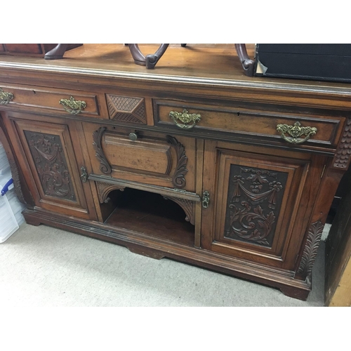 1279 - A Edwardian mahogany sideboard fitted with two drawers and cupboards under . NO RESERVE