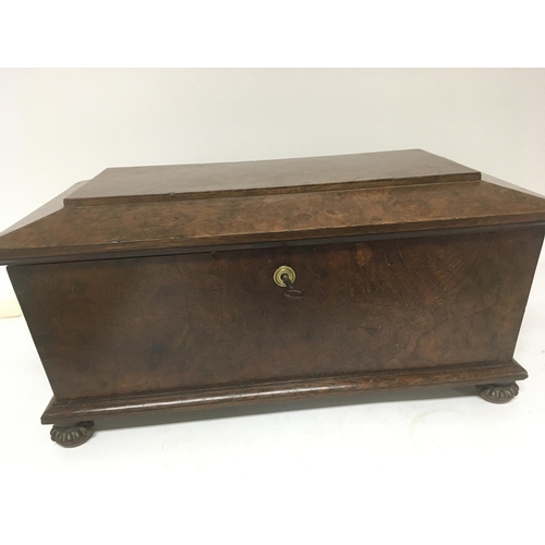 1322 - A Quality Early Victorian walnut tea caddy with a well fitted interior and two sections.