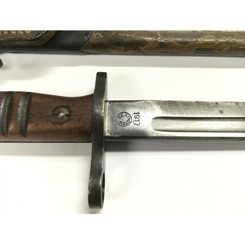 1604 - A WW1 American bayonet, the base of the blade stamped US Remington 1917.