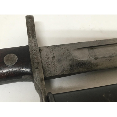 1618 - A Swiss II world war bayonet with makers marks and serial number.