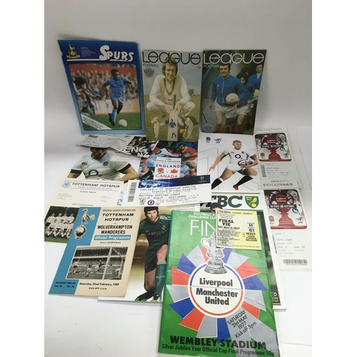 1710 - A collection of circa 1960s and later Arsenal football programmes including match tickets, a Freddie... 