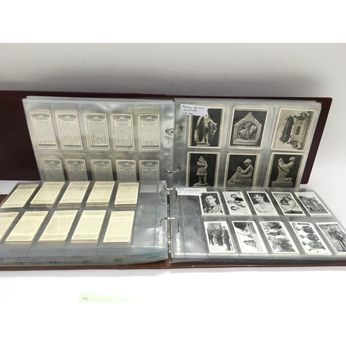 1759 - A collection of cigarette card sets in two albums.