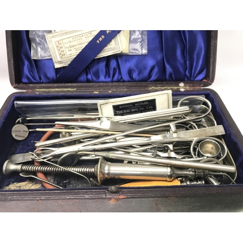 1919 - A case containing surgical instruments.