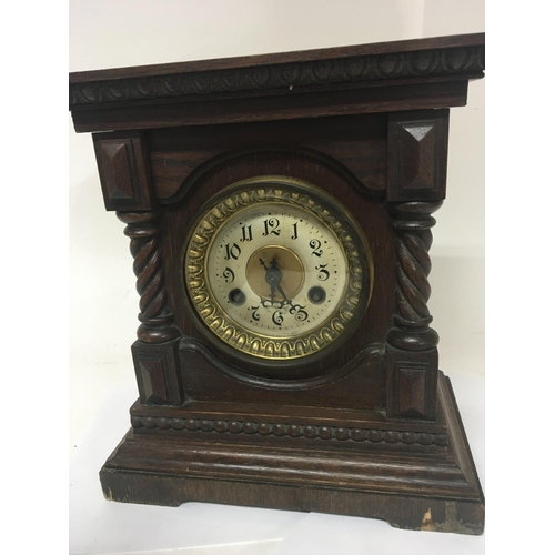 1925 - A Continental walnut mantel clock with spiral pilasters NO RESERVE