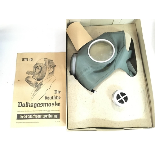 1938 - An S.G & Co LTD 1940 Gas Mask and a Boxed German Gas mask NO RESERVE