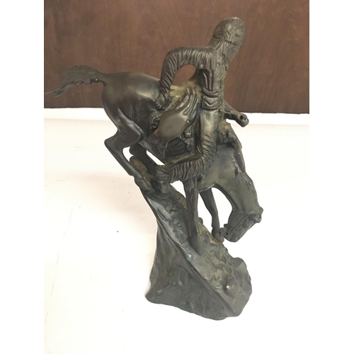 1942 - A Cast Bronze Indian on a Horse Inspired by Frederic Remington. Approximate height 24CM. NO RESERVE