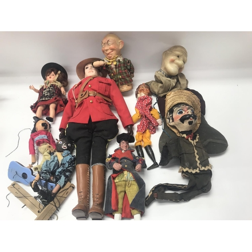 1980 - Collection of various vintage puppets and dolls including a Canadian mounted police doll