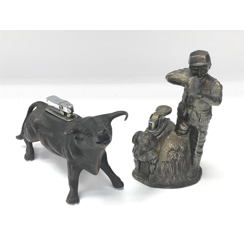 1990 - Vintage table lighter with sportsman with gun and gun dog, and a table lighter of a bronzed bull