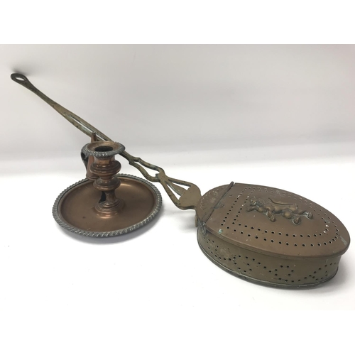 1994 - Good Victorian brass chestnut roaster with lion and chamber stick with snuffer