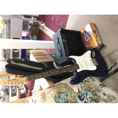 2022 - An Eastcoast electric guitar with practice amp, pedal and stand. A good starter kit for the budding ... 