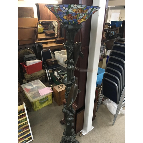 2070 - A modern design dolphin stand lamp with shade. Approximately 6ft tall.