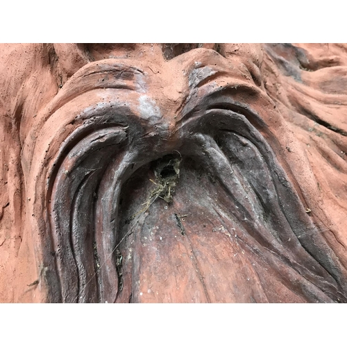 2085 - A large terracotta water feature plaque in the form of a tree spirit