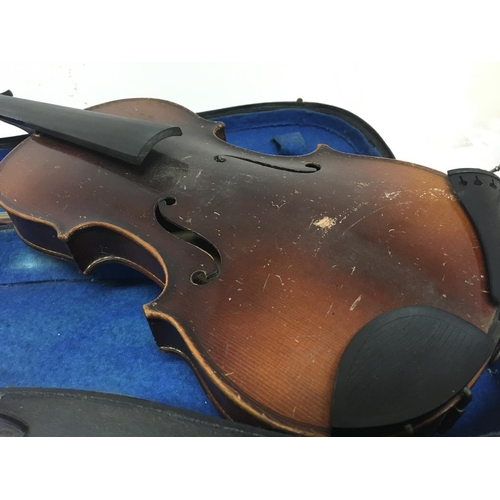 2091 - A 3/4 size violin in a fitted case with bow for restoration with applied Antoninus Stradivarius labe... 