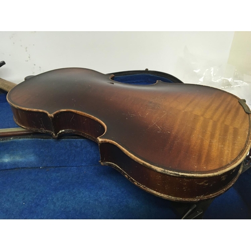 2091 - A 3/4 size violin in a fitted case with bow for restoration with applied Antoninus Stradivarius labe... 