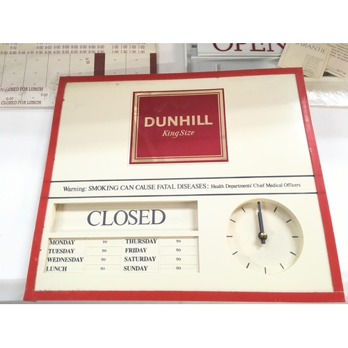 2098 - Three vintage wall shop displays for cigarettes with clocks (battery operated)