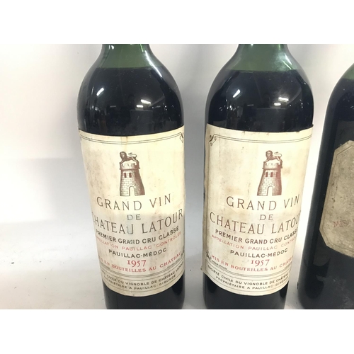 2119 - Three bottles of red wine including two bottles of Grand Vin De Chateau Latour 1957.