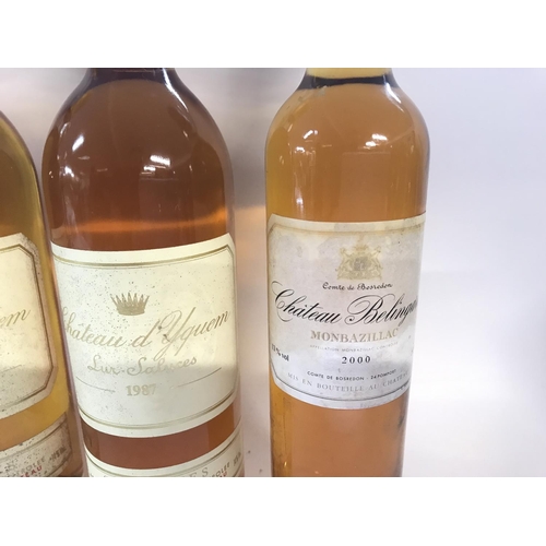 2121 - Collection of four desert wines including two bottles of 1987 chateau dYquem and a bottle from 1982.