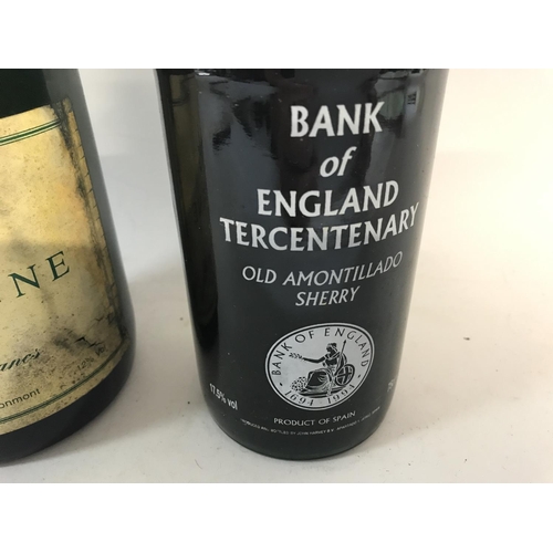 2128 - A magnum of Harrods champagne and a bottle of Bank of England Tercentenary old amontillado Sherry.