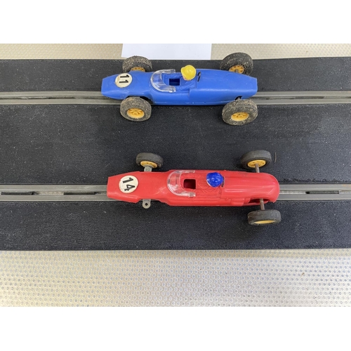 2135 - A collection of Scalextric cars, racing track and accessories