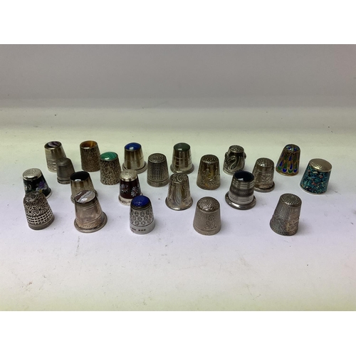 705 - 22 various hallmarked Silver thimbles.