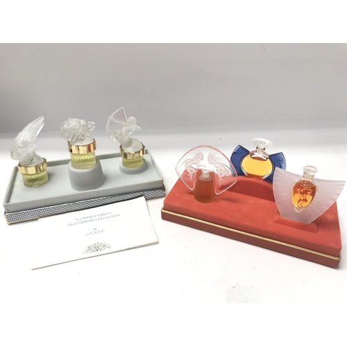 727 - 2 Lalique unused miniature perfume sets