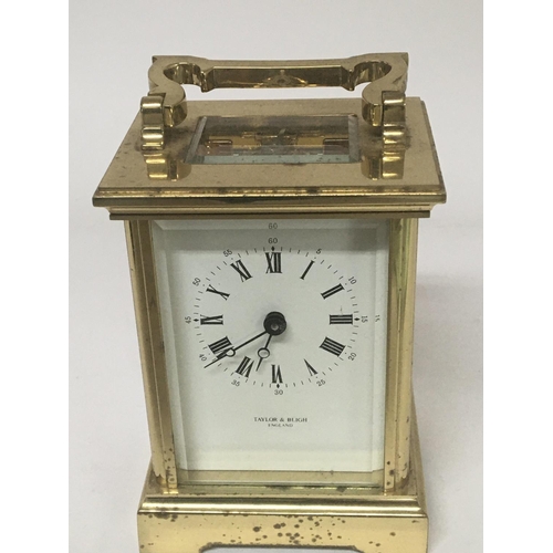 734 - A brass carriage clock by Taylor & Bligh England.