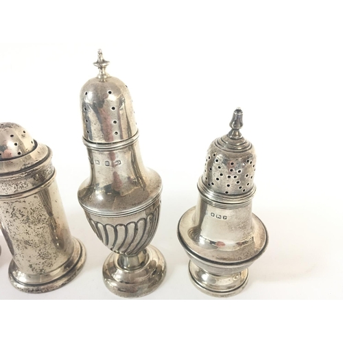 743 - 4 hallmarked silver pepper casters. 1891 - 1912 - 1916 - 1994.