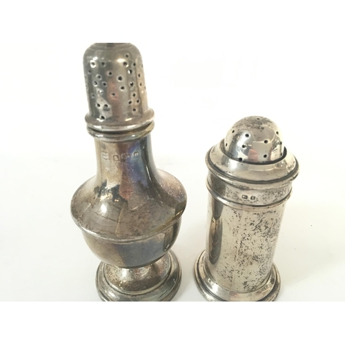 743 - 4 hallmarked silver pepper casters. 1891 - 1912 - 1916 - 1994.