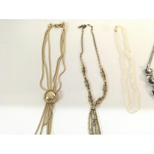 748 - Collection of various necklaces including a restrung Pearl necklace with gold clasp.