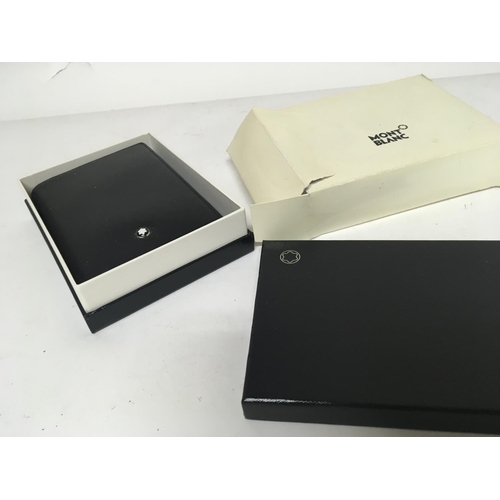 757 - A Genuine Mount Blanc leather note pad with pen boxed.