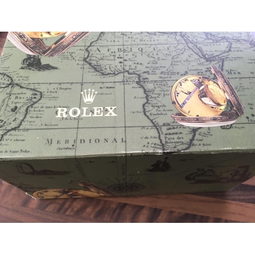 776 - A Rolex vintage box with paperwork .