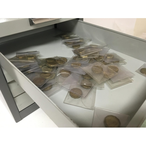 780 - A metal cabinet containing a large quantity of mixed bronze coinage.