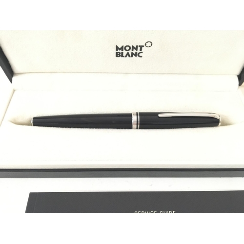 794 - A Mont Blanc pen with box and service guide.