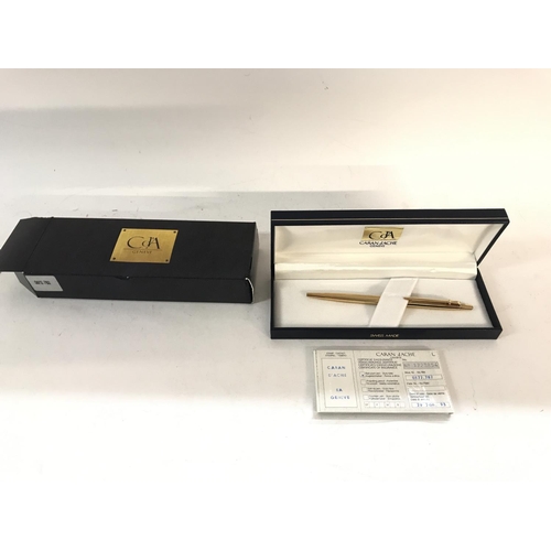 807 - A cased Caran DAche gold pen model number 0872.782. Comes with its certificate of insurance from whe... 