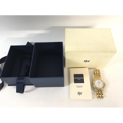 808 - A Raymond Weil Tango watch with box.