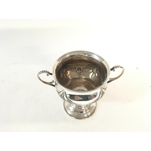 811 - A hallmarked silver trophy cup.