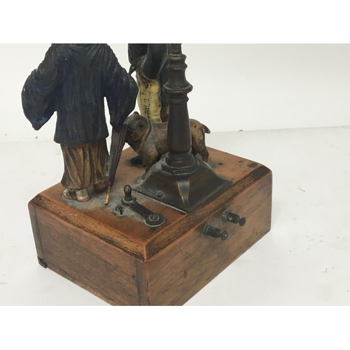 823 - An unusual early 20th century table lamp with painted metal figures East meets West with a pug dog a... 